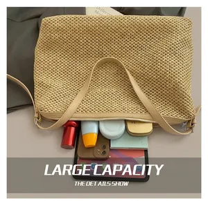 Interior view showing the large capacity and storage space of the woven tote bag