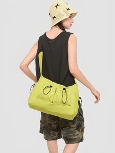Neon green large nylon tote bag with utility drawstring pockets for casual wear