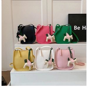 Detailed display of mini saddle buckets in six vibrant colors with pegasus charms