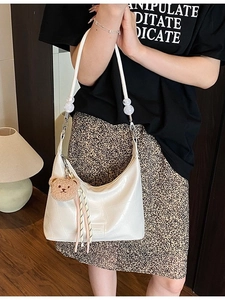 White crocodile pattern half-moon shoulder bag with chain strap and teddy bear charm