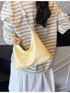 Classic yellow crescent shoulder bag with crocodile pattern and decorative white pearls