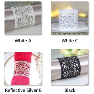 Laser-cut hollow napkin rings in gold, silver, and black for wedding table decoration