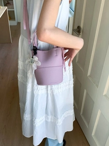 Chic lavender lychee-patterned bucket bag with floral charm for daily commuting