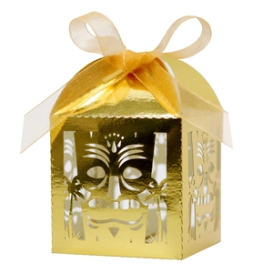 Laser-cut gold party gift box with Tiki mask hollow pattern and golden ribbon bow