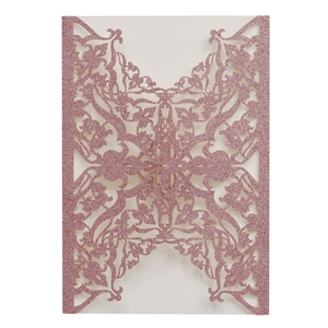 Elegant rose gold laser-cut floral wedding invitation cover with glitter finish