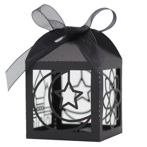 Laser-cut matte black Eid Ramadan gift box with mosque silhouette and ribbon bow