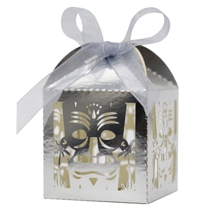 Laser-cut silver Tiki mask favor box with light blue ribbon for party candy and chocolate