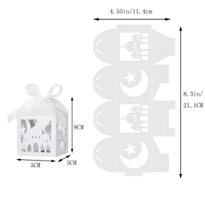 Detailed view of white laser-cut gift box with mosque star-moon pattern and ribbon
