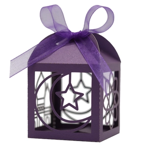 Purple hollow Ramadan gift box with laser-cut crescent stars and silk ribbon