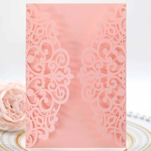 Pink laser cut wedding invitations with elegant floral vine hollow design for events
