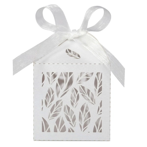Detailed laser cut white cardstock candy box with hollow leaf pattern and ribbon bow
