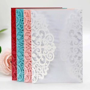 Laser cut floral hollow invitation cards in red, cyan, pink, and white pearl paper
