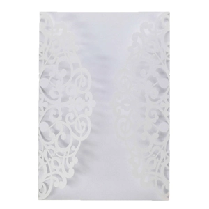 Elegant white laser cut wedding invitation cover with floral and vine scrollwork