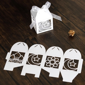 Detailed laser cut favor box showing flat template and assembled white ribbon box