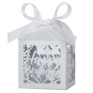 Detailed close-up of white laser-cut Happy Birthday gift box with elegant ribbon bow