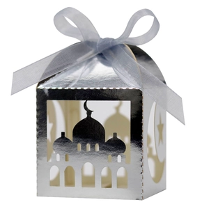 Silver laser-cut candy box with mosque pattern, crescent moon details and blue ribbon