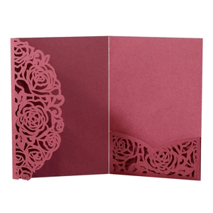 Elegant burgundy laser-cut hollow rose wedding invitation cover with intricate floral patterns