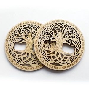 Detail of laser-cut Tree of Life wooden coasters with Celtic patterns, set of 2 pieces