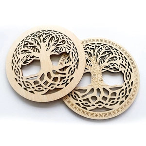 Set of two Tree of Life laser-cut wooden coasters featuring intricate geometric borders