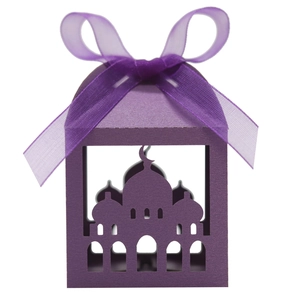 Detail of purple laser-cut gift box with moon and mosque pattern and organza ribbon
