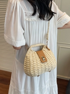 Chic woven straw crossbody bag with brown leather flap and metal turn-lock for summer
