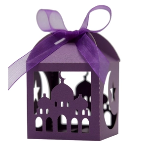 Detail of purple laser-cut gift box with mosque motifs and star patterns for Ramadan