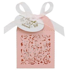Pink laser-cut rose gift box featuring a white ribbon bow and gold thank you tag
