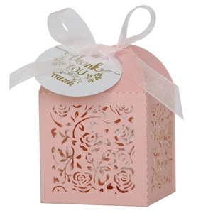 Pink laser-cut rose gift box with white ribbon and 'Thank You' tag on white background