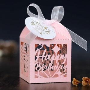 Pink laser-cut Happy Birthday candy box with white ribbon and thank you tag detail