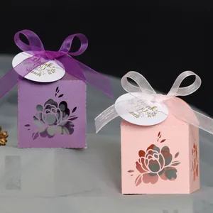 Detailed laser-cut floral candy box with purple satin ribbon and thank you tag decoration