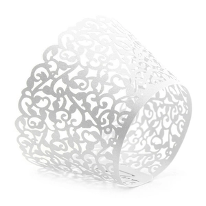 Macro detail of laser-cut vine lace pattern on white paper cupcake wrappers