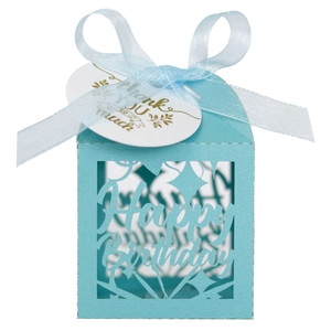 Close-up of light blue laser-cut Happy Birthday gift box with silk ribbon and thank you tag