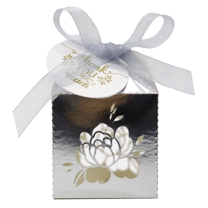 Detail of silver laser-cut floral wedding gift box with ribbon and Thank You tag