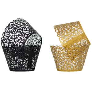 Laser-cut cupcake wrappers with elegant vine patterns in matte black and glittery gold