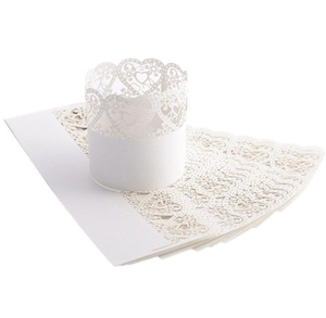 Detail of white laser-cut paper candle wrap featuring intricate heart and lace patterns