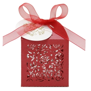 Detail of red laser-cut rose gift box with chiffon ribbon and Thank You hang tag