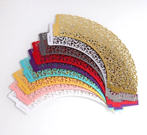 Detailed laser cut filigree cupcake liners in a variety of vibrant metallic colors