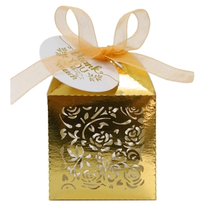 Detailed laser-cut gold wedding favor box with rose patterns and Thank You tag