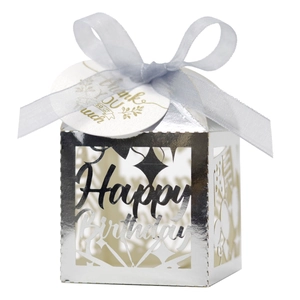 Silver laser-cut Happy Birthday candy box with blue ribbon and Thank You tag for parties