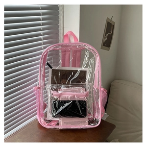 Detail of transparent pink PVC backpack featuring reinforced nylon straps and side mesh pockets