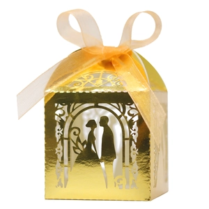 Golden laser-cut wedding candy box with bride and groom silhouette and ribbon