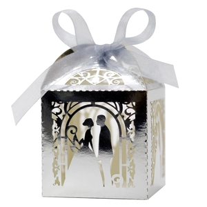 Laser-cut silver wedding candy box with bride and groom silhouette and blue ribbon bow