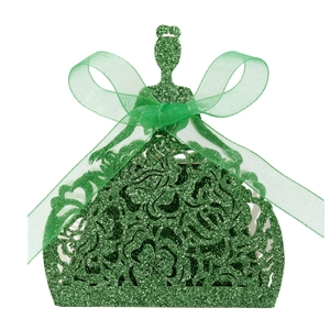 Close-up of laser-cut emerald green party favor box in princess dress shape with glitter