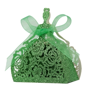 Green glitter dress-shaped favor box with laser-cut patterns and a sheer ribbon bow