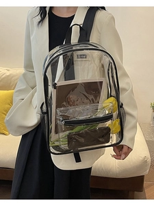 Transparent PVC backpack with black straps and large capacity shown on a model