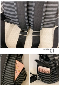 Detail of reinforced shoulder straps and side pockets on the striped canvas backpack