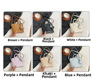 Mini crocodile pattern bucket bags shown in six colors with heart charms and straps