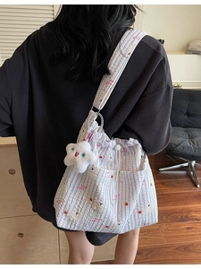 Sac seau en nylon rayé violet clair avec motifs d'animaux et breloque étoile en peluche