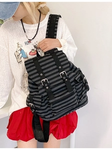 Retro striped backpack with flap closure and buckle straps for campus or casual travel