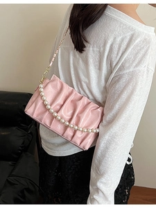 Pink pleated cloud bag with pearl chain and golden metallic strap for women
